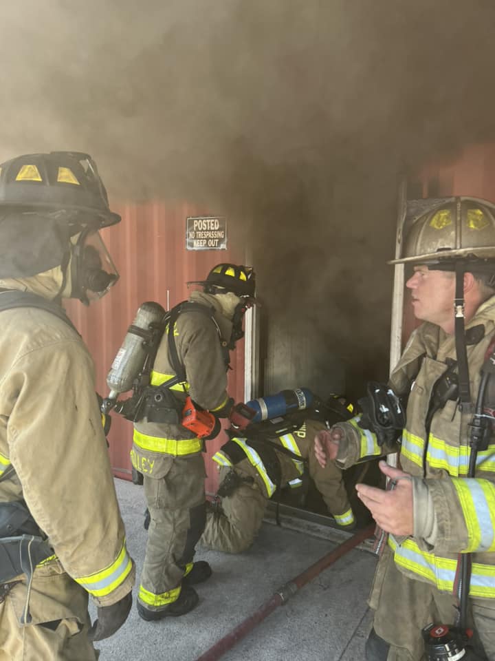 Firefighters Entering Entryway with Smoke