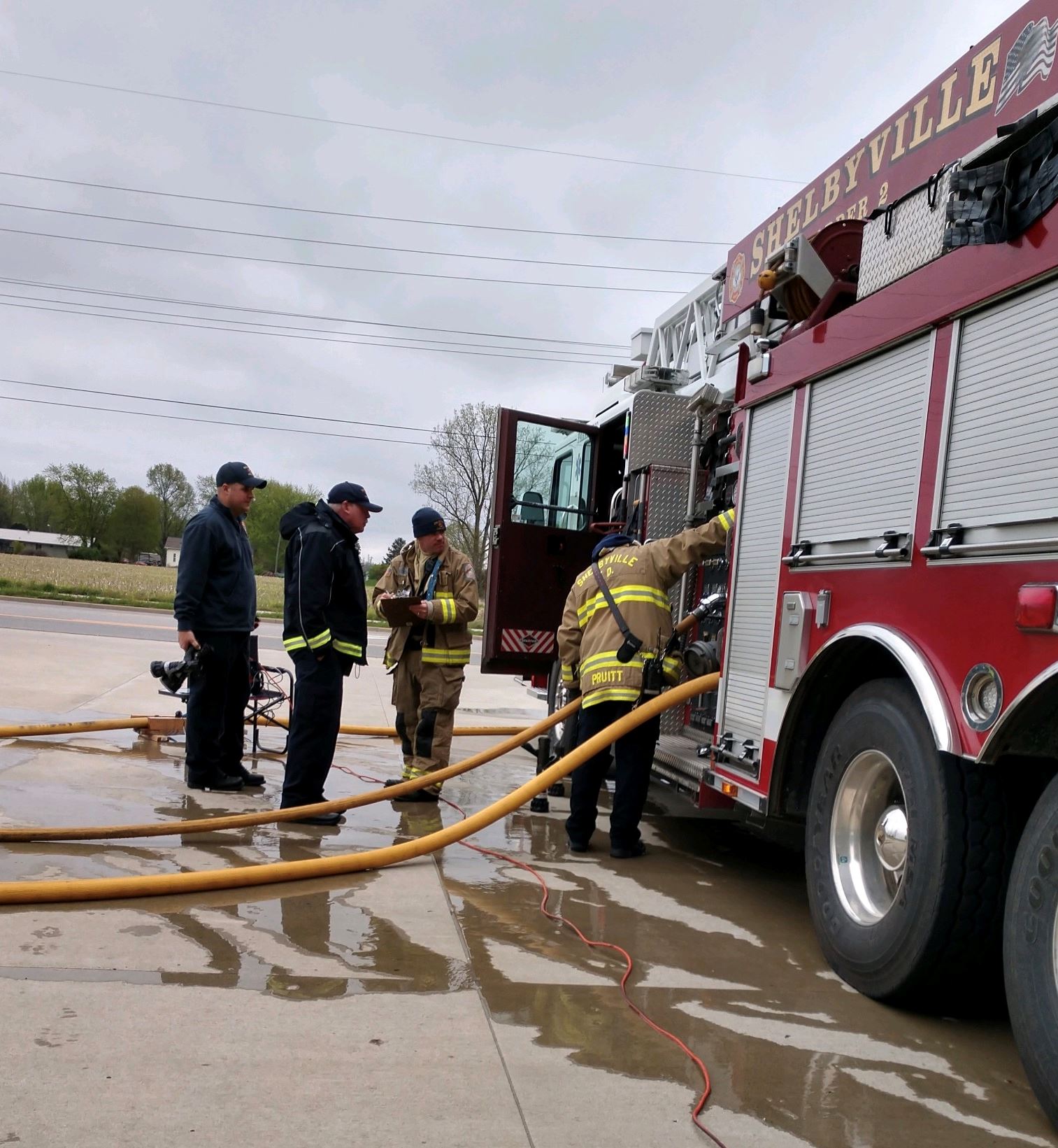 Firefighters Using Yellow Hose 2