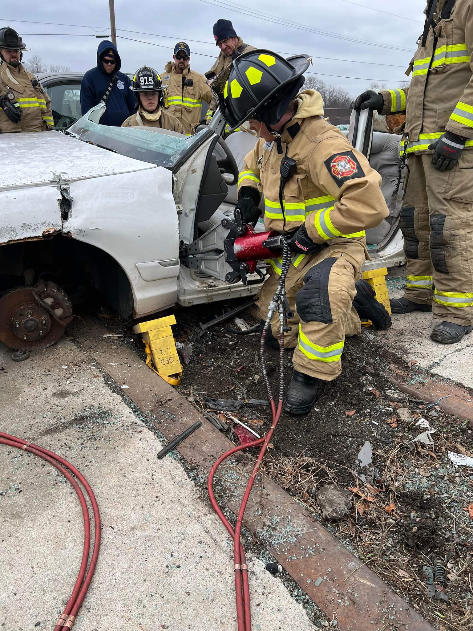 Firefighters Opening Damage Vehicle